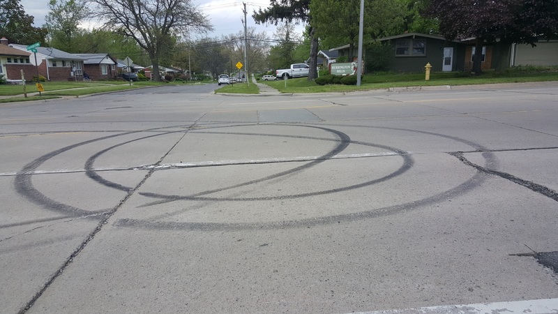 Illustration for article titled This Dodge Challenger Ripping Donuts Next To A VW TDI Graveyard Has To Mean Something